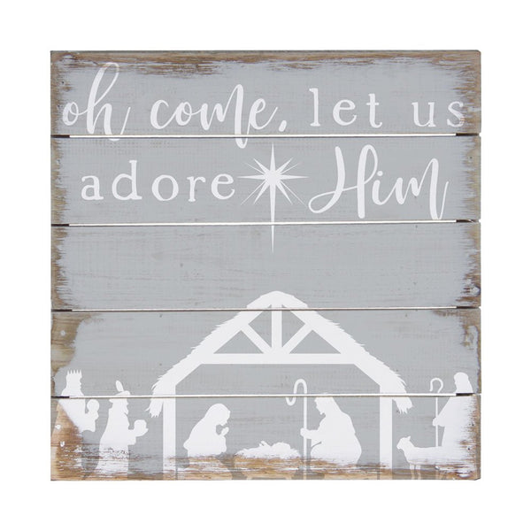 Rustic wall art featuring the phrase 'oh come, let us adore Him' with nativity scene silhouettes.