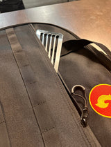 Close-up of kitchen tools stored in the Skwok Bag, showcasing its practicality and design.