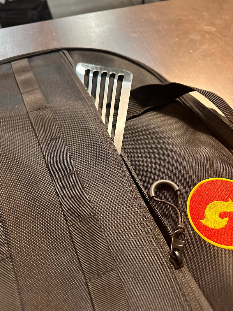 Close-up of kitchen tools stored in the Skwok Bag, showcasing its practicality and design.